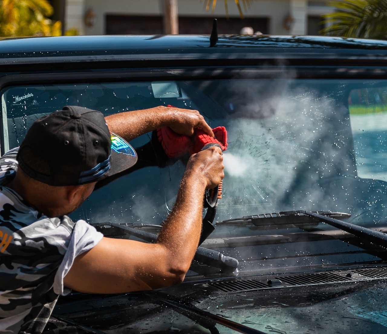 Cleaning car windows with steam